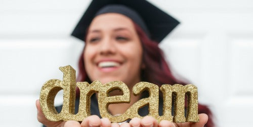grad cap girl dream in hands compliment sacramento